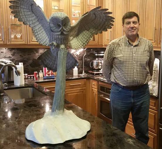 Great Grey Owl wood sculpture, front view with wings spread